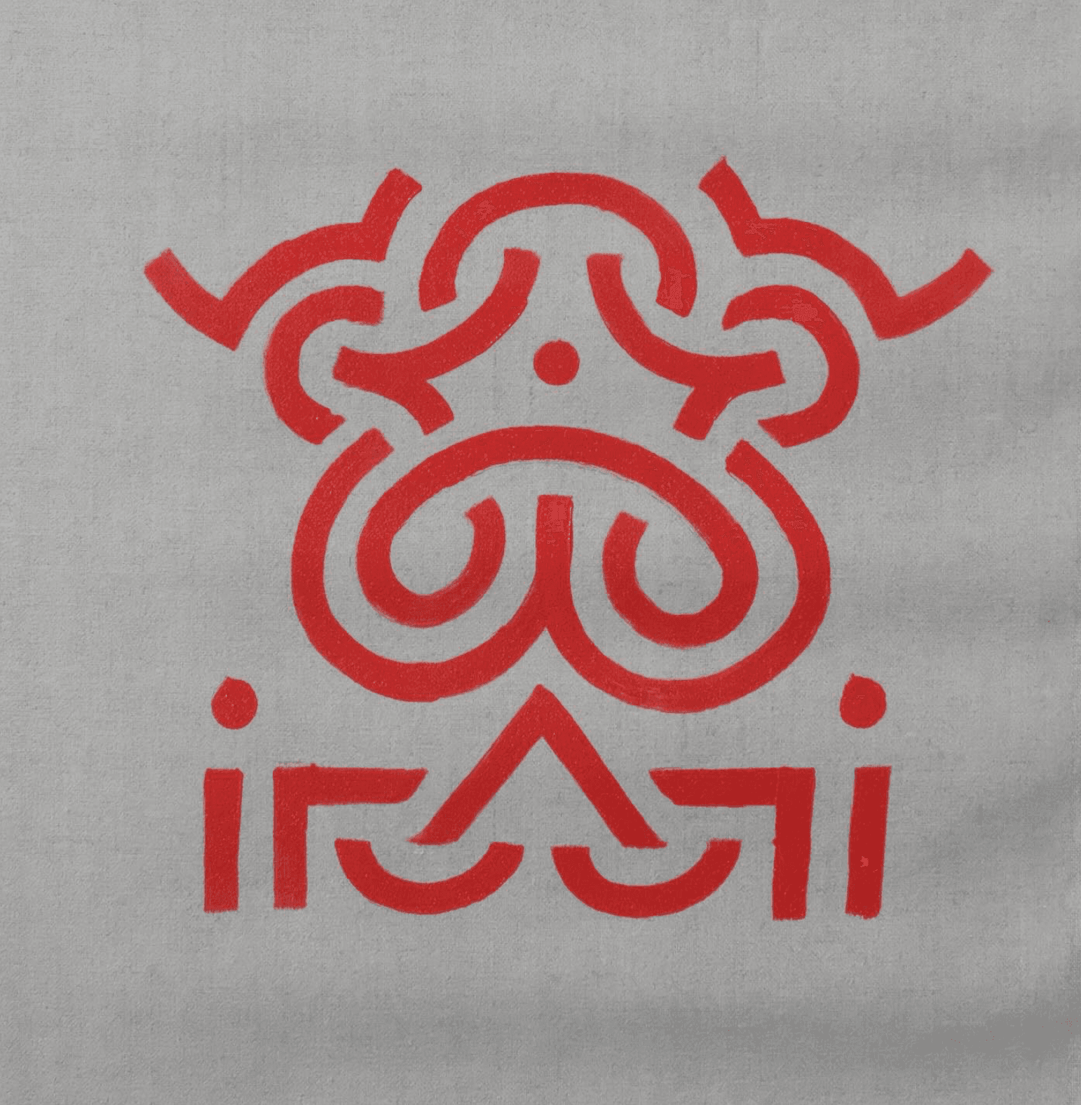 Red symmetrical totem sigil on raw linen.